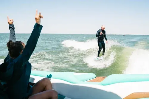 a person wakesurfing