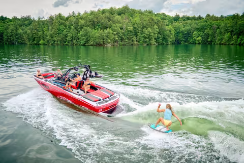 wakesurfer behind boat