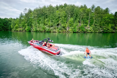 wakesurfer behind boat