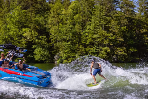 wakesurfing behind a boat